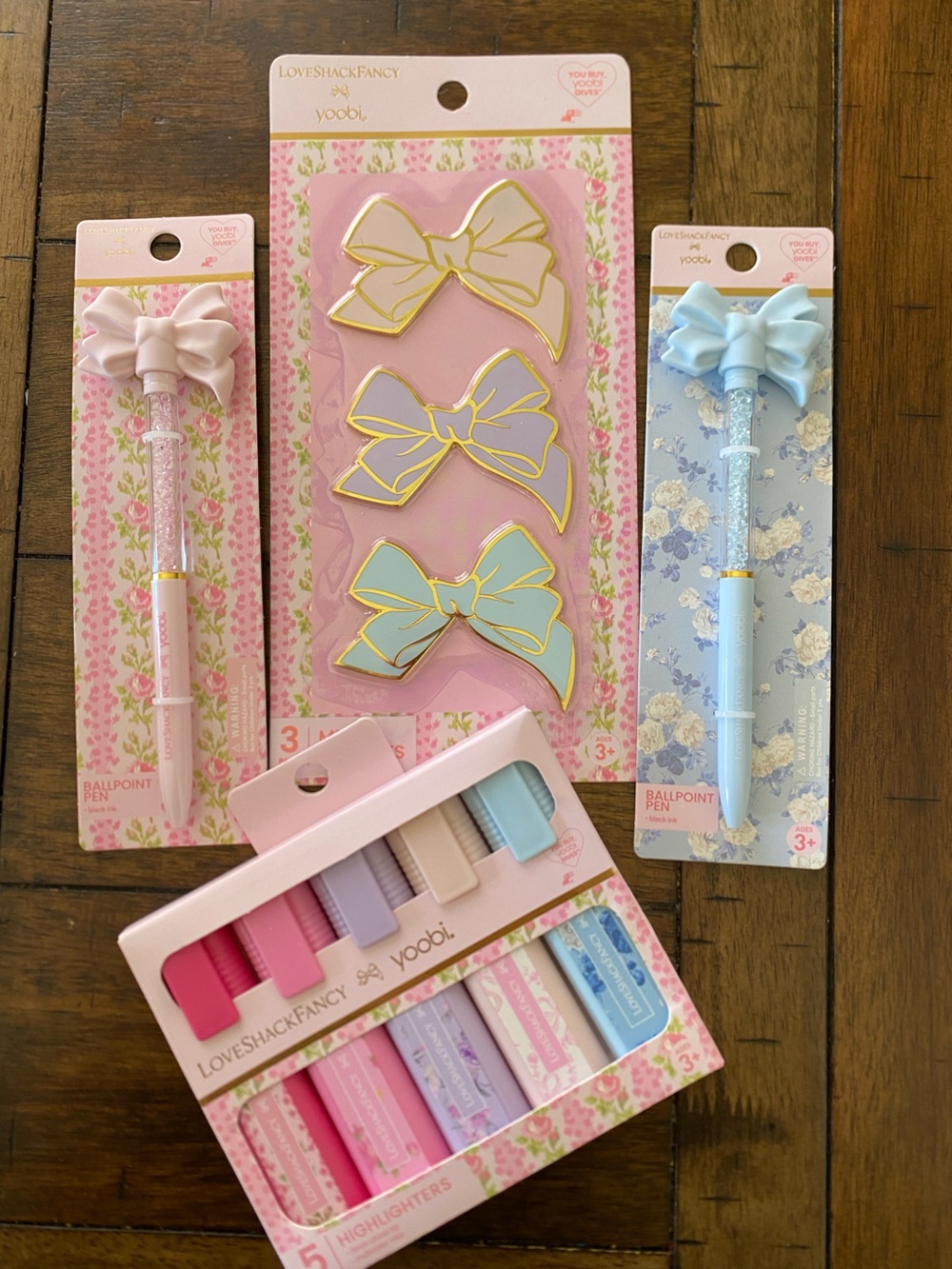 LoveShackFancy Blue Bow Pen, Pastel Bow Magnets Set, and Highlighters